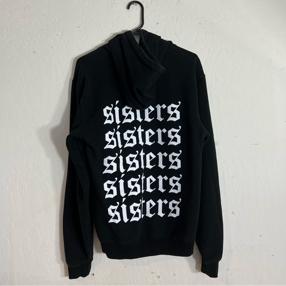 Sisters Hoodie By James Charles Black pullover long sleeves Repeating SISTERS